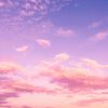 Pink and purple evening sky with clouds Pink and purple clouds in evening sky