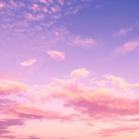 Pink and purple evening sky with clouds Pink and purple clouds in evening sky